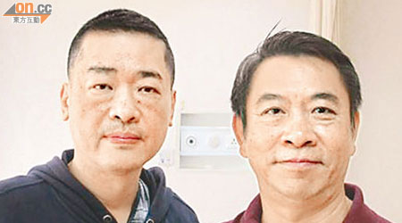 廖潔明（右）昨到上海探望陳思祺（左），指陳的病情好轉。
