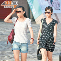 本港昨天晴炎熱，市民外出均穿着短裙、熱褲消暑。（羅錦鴻攝）