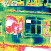 高清紅外線掃描圖片中的紅色部分為滲水位置，可見外牆滲水情況嚴重。（賴達明提供）