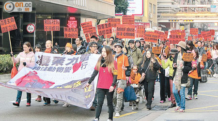 澳門有團體發起遊行，要求澳門政府盡快立法保護動物。