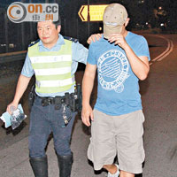 涉嫌在上水非法賽車男子被帶返警署。