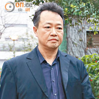 海事處助理處長 蘇平治 <br>蘇平治昨出入中區警署時神色均顯得非常凝重。（梁鵬威攝）