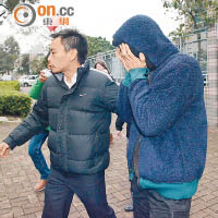 案中假丈夫廖健明（右）獲特赦出任控方證人頂證被告。