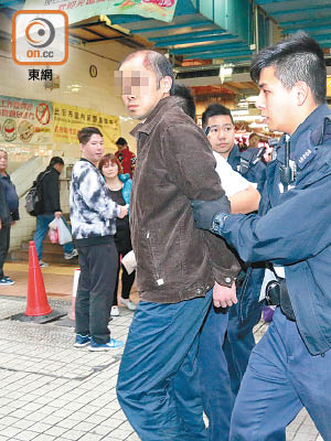 涉案男子被警員拘捕。（林振華攝）