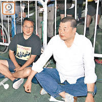 壹傳媒集團前主席黎智英（右）亦有出席維園集會，左為民主黨前主席李永達。