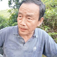 勞工處前助理處長麥世耀否認改建寮屋，稱只是「改善」。（傳真社）