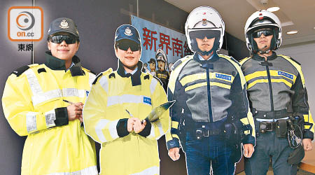 鋁板警察不時有真警員拍檔執勤，圖中左、右男女警便是真身上陣。（伍鎮業攝）