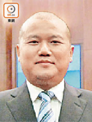 澳門立法會議員 陳明金