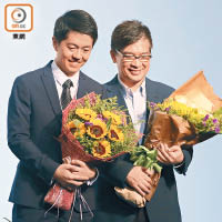 民主黨候選人許智峯（左）於香港島奪得一席位。
