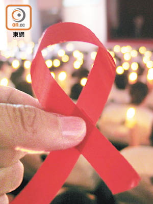 愛滋病病人依時服藥，可有效控制病情。（資料圖片）
