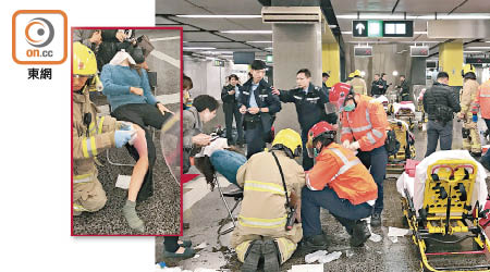 救護員為面及腳部受傷女乘客急救。（鍾健國攝）