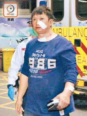 男事主面、頸及手部受傷。（梁國雄攝）