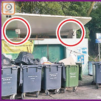 荃灣老圍<br>仍設有「天眼」（紅圈示）的荃灣老圍垃圾站外，有假天花建築物料堆滿整架垃圾車。