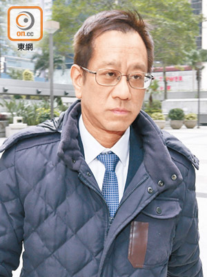被告袁大鵬被控公職失當及串謀詐騙等罪，昨於區院受審。（羅錦鴻攝）