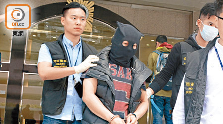 涉電騙案的台灣男子被司警拘捕。