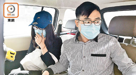 第三被告譚浩傑（右），昨被判240小時社會服務令。