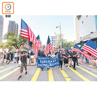 反修例遊行示威經常出現美國國旗。