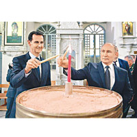 普京（右）突訪敍利亞，與該國總統巴沙爾．阿薩德（左）會面。