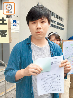 警方昨午在李軒朗（圖）的辦事處搜出寫上「光復香港」及「時代革命」等字樣的手寫揮春。