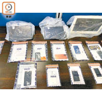警方在行動中檢獲一批電腦及智能電話。