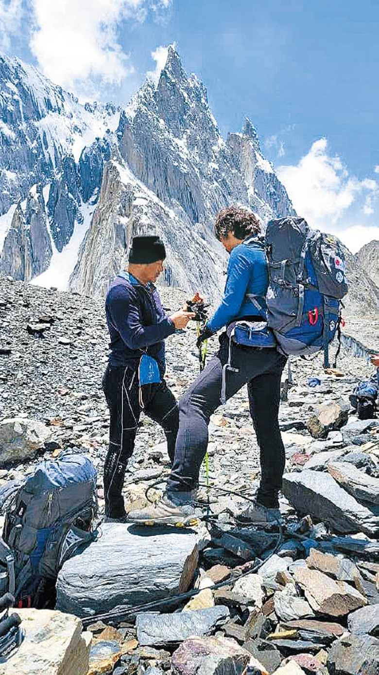 金洪彬（右）登山經驗豐富。