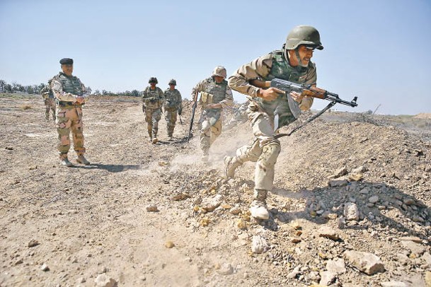 伊拉克政府軍接受美軍訓練。（Getty Images圖片）