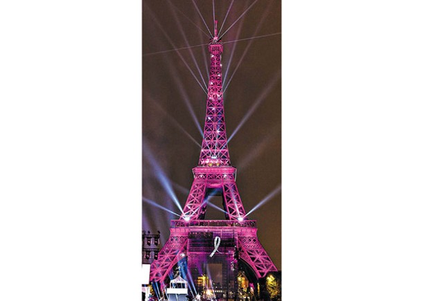 艾菲爾鐵塔亮起粉紅色燈光。（Getty Images圖片）