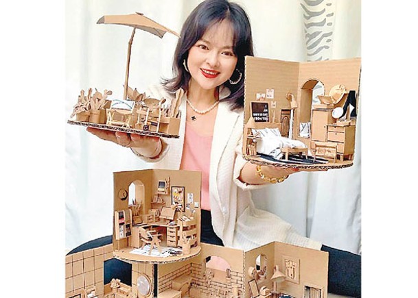 林女士以紙箱等材料造出別墅微縮模型。