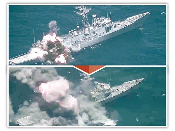 上及下圖：羅德尼戴維斯號遭導彈擊中，冒出濃煙。