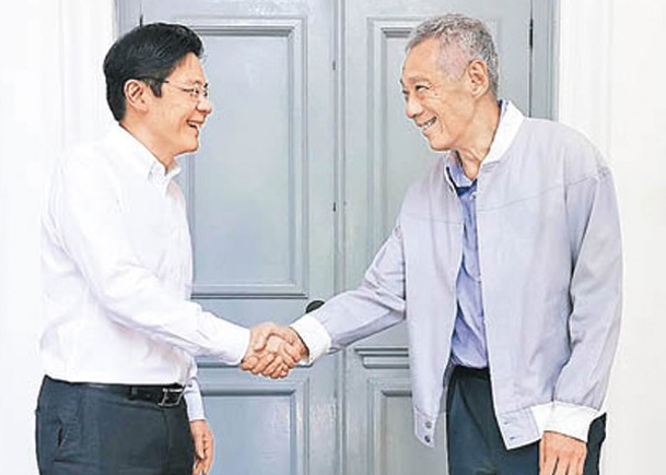 黃循財（左）將接替李顯龍（右）出任新加坡總理。