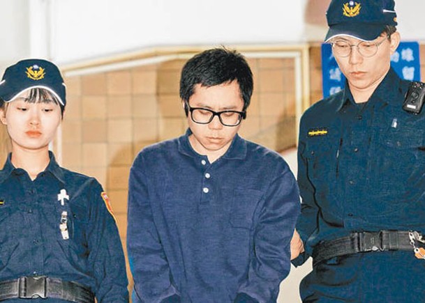 陳男（中）遭台北士林地方法院判無期徒刑。