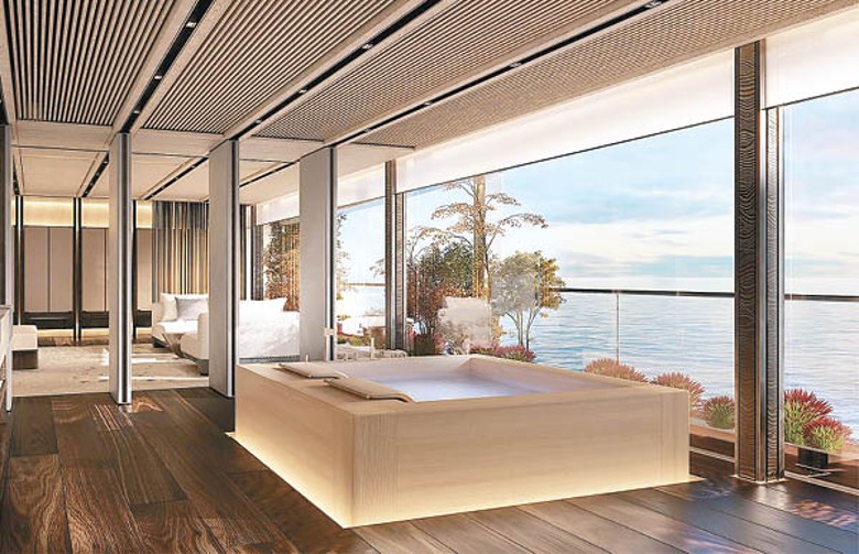 VIP套房的浴室有個採用珍貴扁柏木打造的大浴缸，其位置可欣賞到絕佳海景。