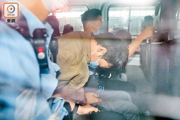 被告李啟昌被解往法院提訊。