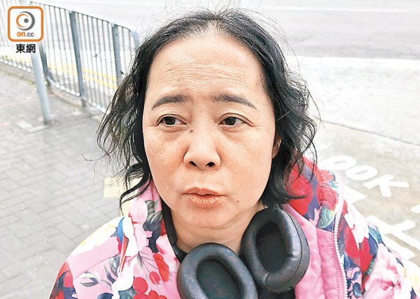 李女士認為要改動煙蒂箱位置，減少對附近居民影響。