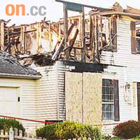陳和璧及楊啟玲居住的房屋，二樓被嚴重燒毀。	（本報美國傳真）