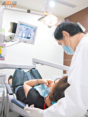 有牙醫呼籲民眾應確認植牙手術由執業牙醫進行。（本報台北傳真）