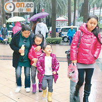 深圳昨降雨兼大降溫，市民添厚衣抵寒流。（張琦攝）