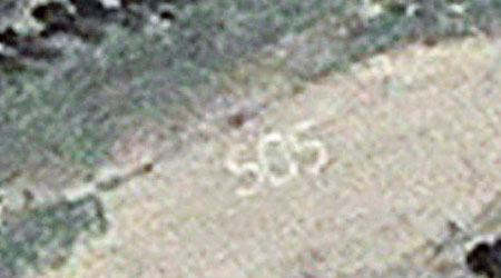 友人偽造出謝里登在沙灘寫下求救訊號ＳＯＳ的照片。（互聯網圖片）
