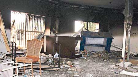 班加西領事館當年遭暴民放火搶掠，被指是哈塔拉策動的恐襲。