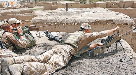 哈里森在阿富汗服役時遠距離槍殺敵人。圖為當地作戰的英軍。（資料圖片）