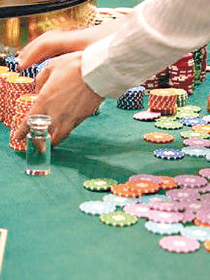 不法分子請來曾在賭場工作的女子任荷官一起騙財。（資料圖片）