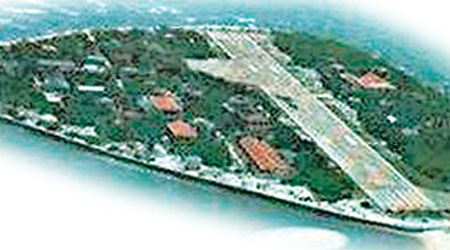 中國在南海築人工島礁的行動引起多國爭議。