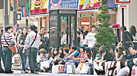 東京銀座向來為中國遊客購物熱點。（資料圖片）