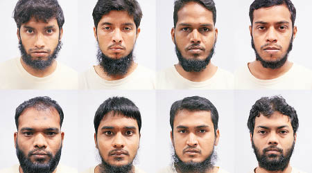 新加坡拘捕八名孟加拉男子，下排右一為拉赫曼。（新加坡內政部圖片）