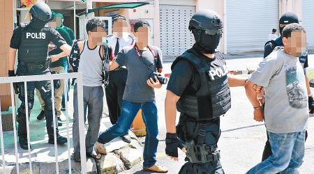 馬來西亞警方拘捕多名恐怖分子。（馬來西亞警方圖片）