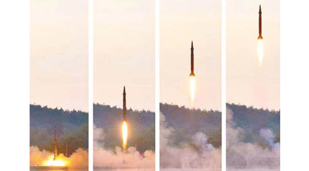 北韓成功試射彈道導彈，宣稱準確命中目標。（北韓《勞動新聞》圖片）