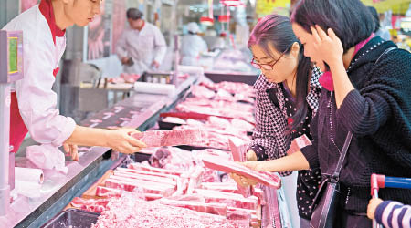 中國的豬肉價格節節上升。（中新社圖片）