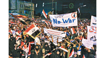 什葉派的支持者在巴格達示威。（美聯社圖片）