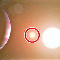 TOI 1338b（紅圈示）是一顆環聯星運轉行星。