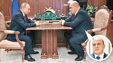 普京（左）提議由米舒斯京（右）出任總理。（美聯社圖片）
